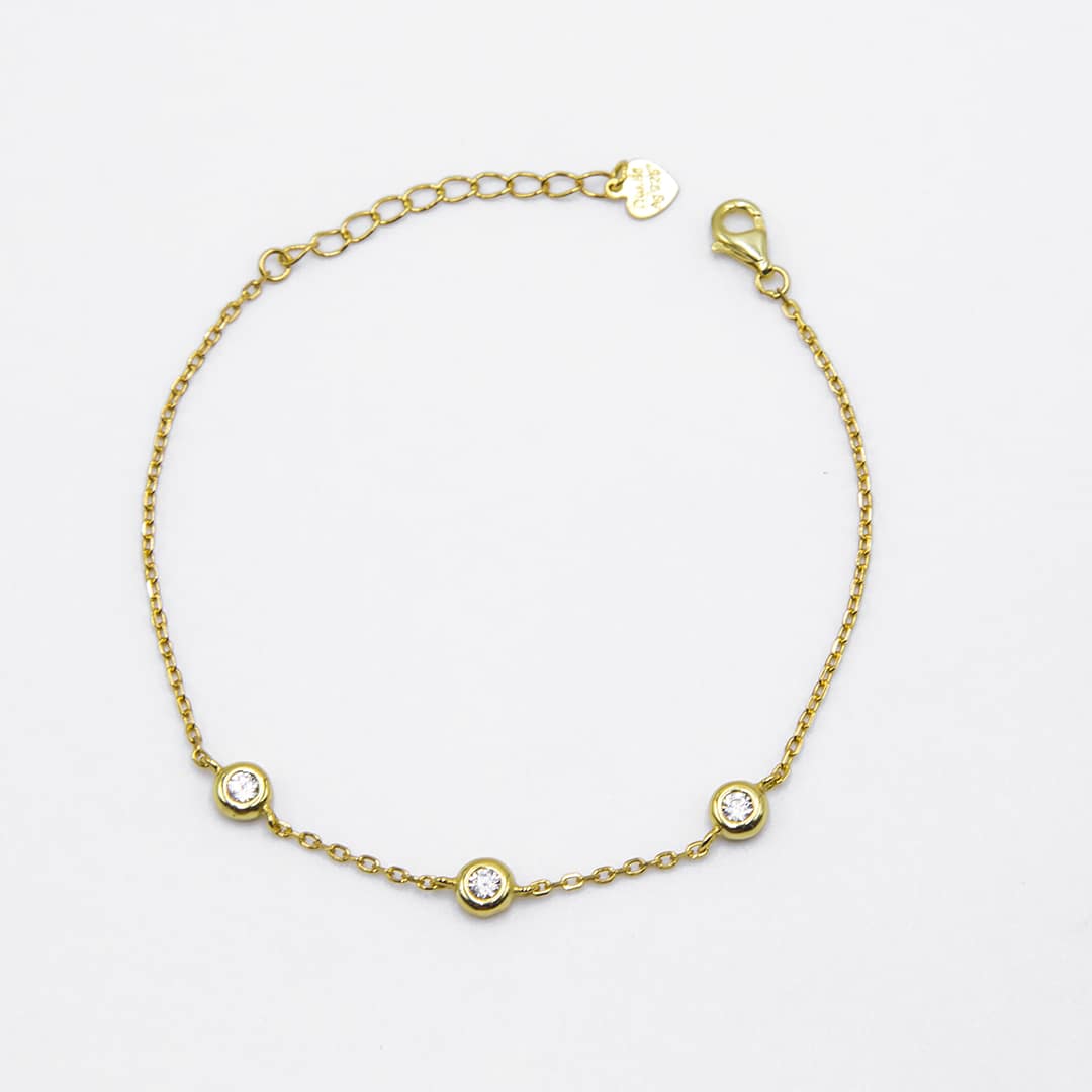 PULSERA TRES CHATONES DORADOS